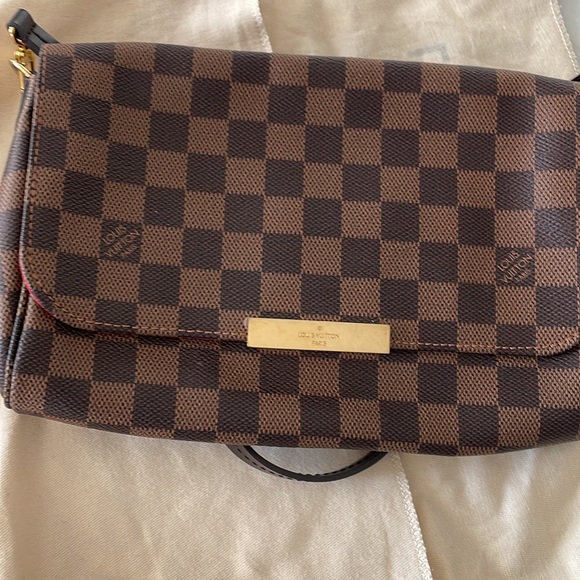 Louis vuttion medium purse in brand new condition been only worn twice. - Picture 2 of 2